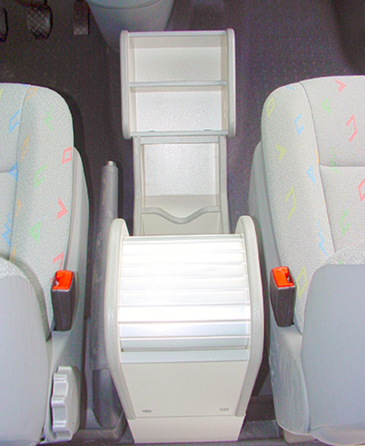 A closed compartment and four open storage boxes