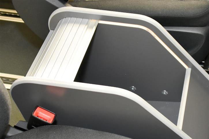 Additional storage space behind a rattle-free roller shutter.