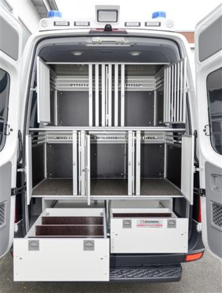 Air-conditioned dog crates for 5 dogs. Underneath storage space for food, water and other supplies 