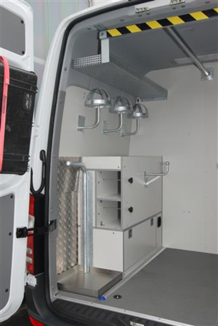 Equipment area in the rear with oxygen tank storage 
