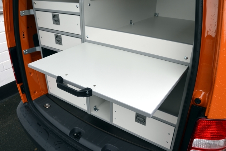 Extendable work surface in the rear 