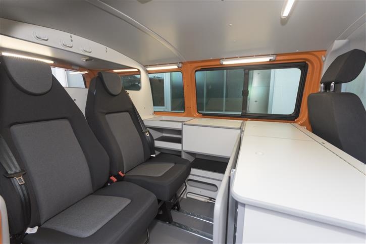 Office space with large work surface, lots of storage space and an additional folding table 