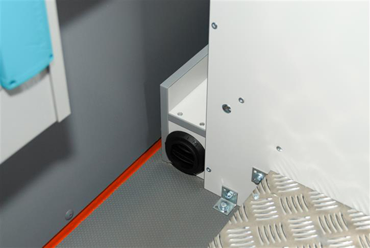 Retrofitted auxiliary heating underneath the vehicle with adjustable vents for the office area (picture) and driver/passenger 