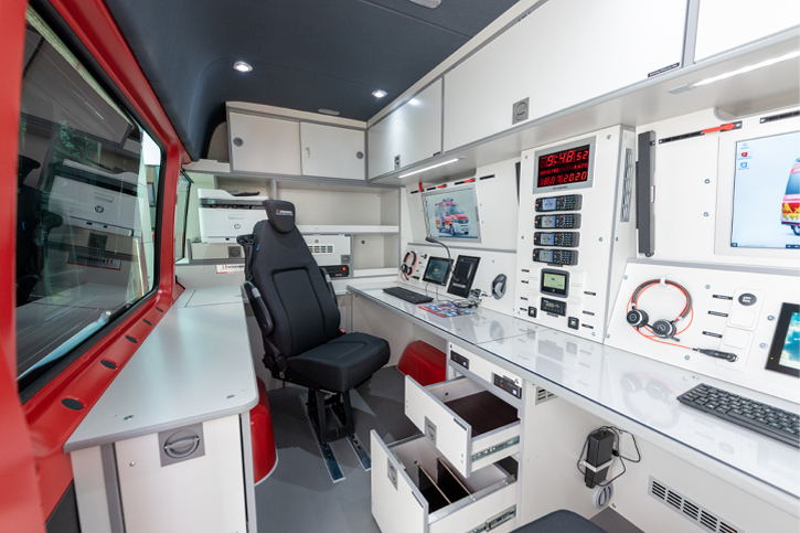 Radio control room with two work stations. Each workstation is equipped with a LARDIS® control center for radio meetings and a computer. 