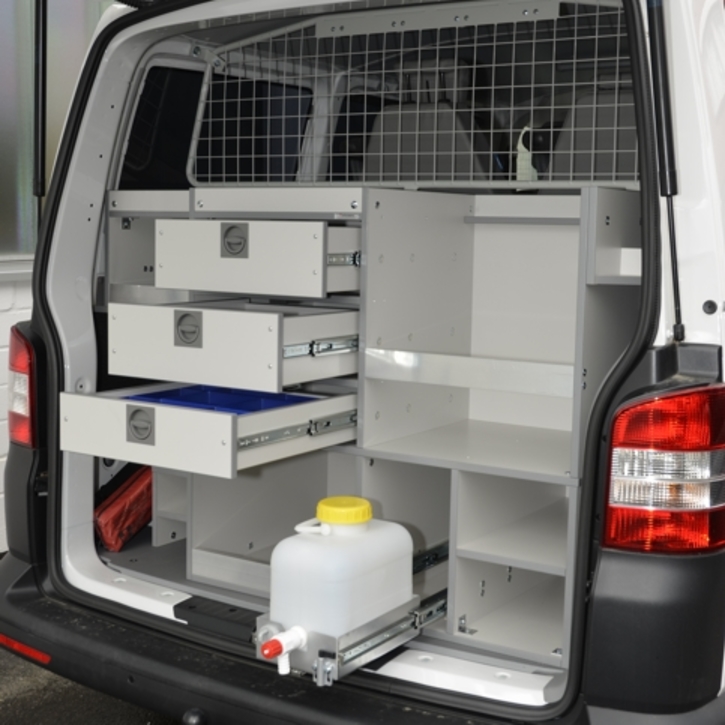 Rear interior with drawers for small parts, room for tool boxes and an extendable water canister 