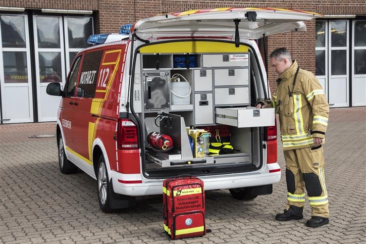 Rear loading concept with various drawers, heat compartment, fridge and bright lighting 