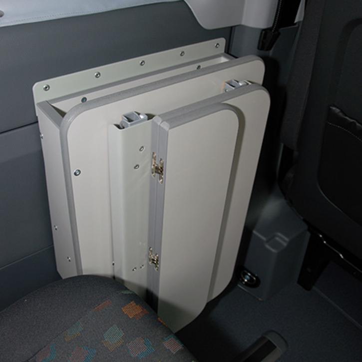 Special construction with a compartment behind the folding table