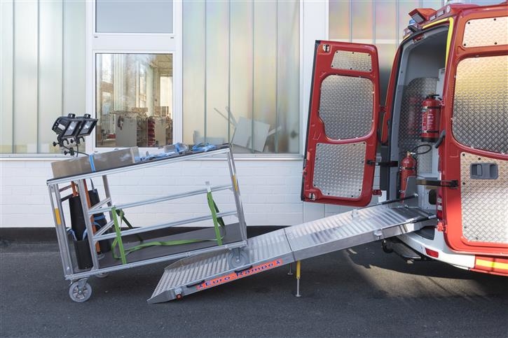 The equipment cart can be pushed into the vehicle over a ramp 