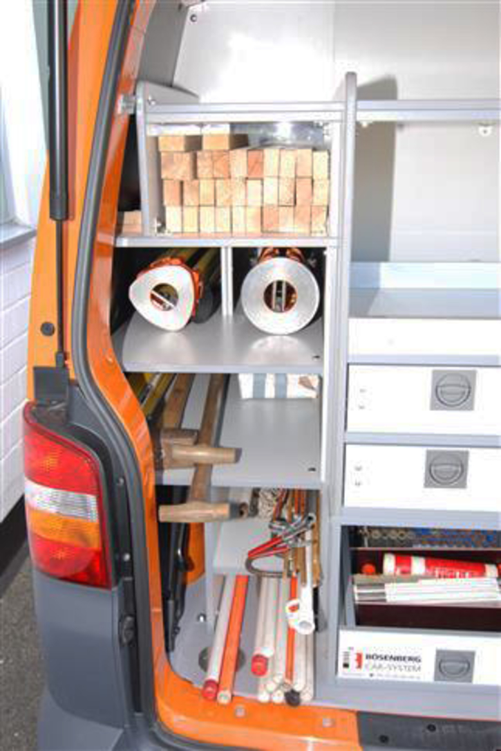 Tripod compartments with anti-slip mat, compartments for ranging poles up to a length of 2,5 m 